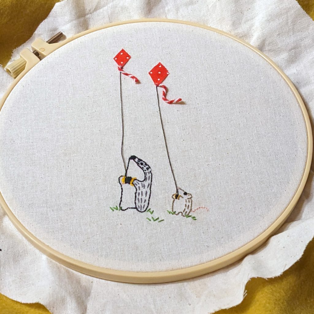 badger and mouse flying kites embroidery still in the no-slip hoop